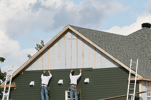 Professional Siding Installation technician working in Webster, IN